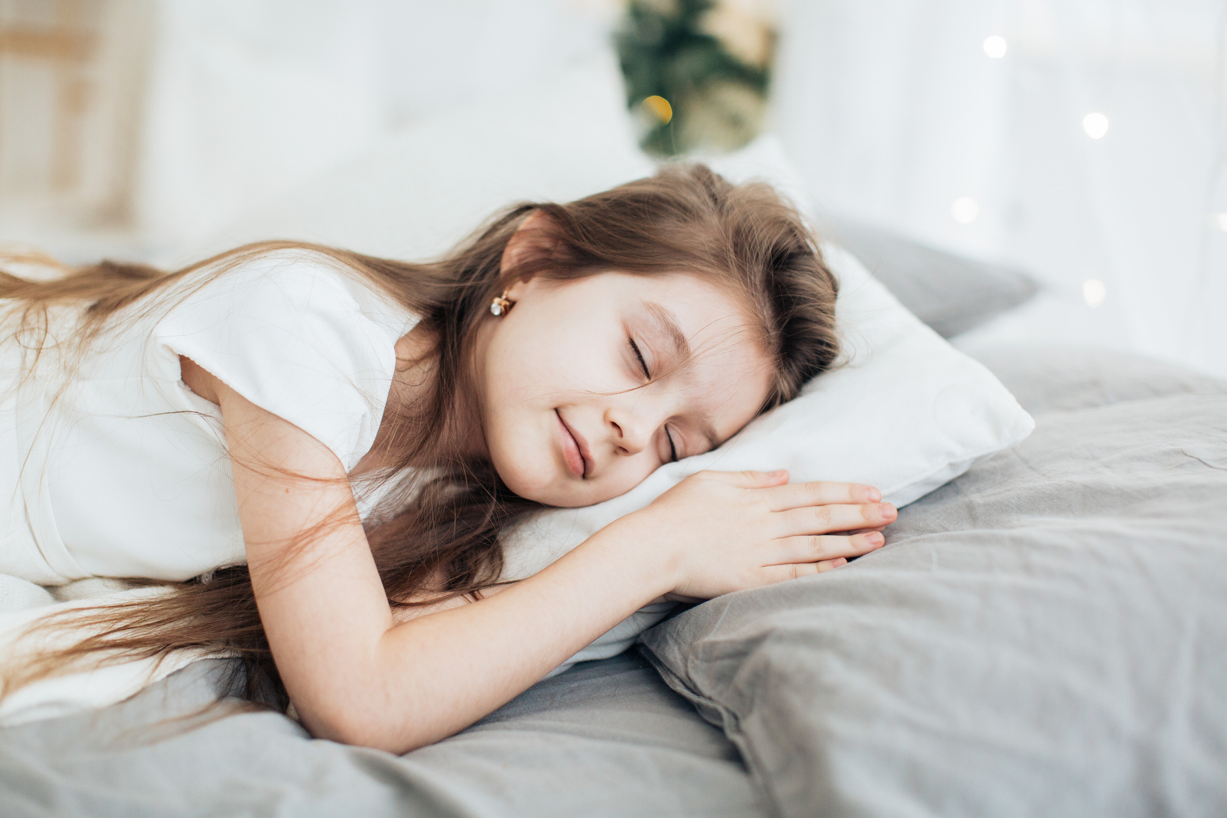 Girl Sleeping in Bed